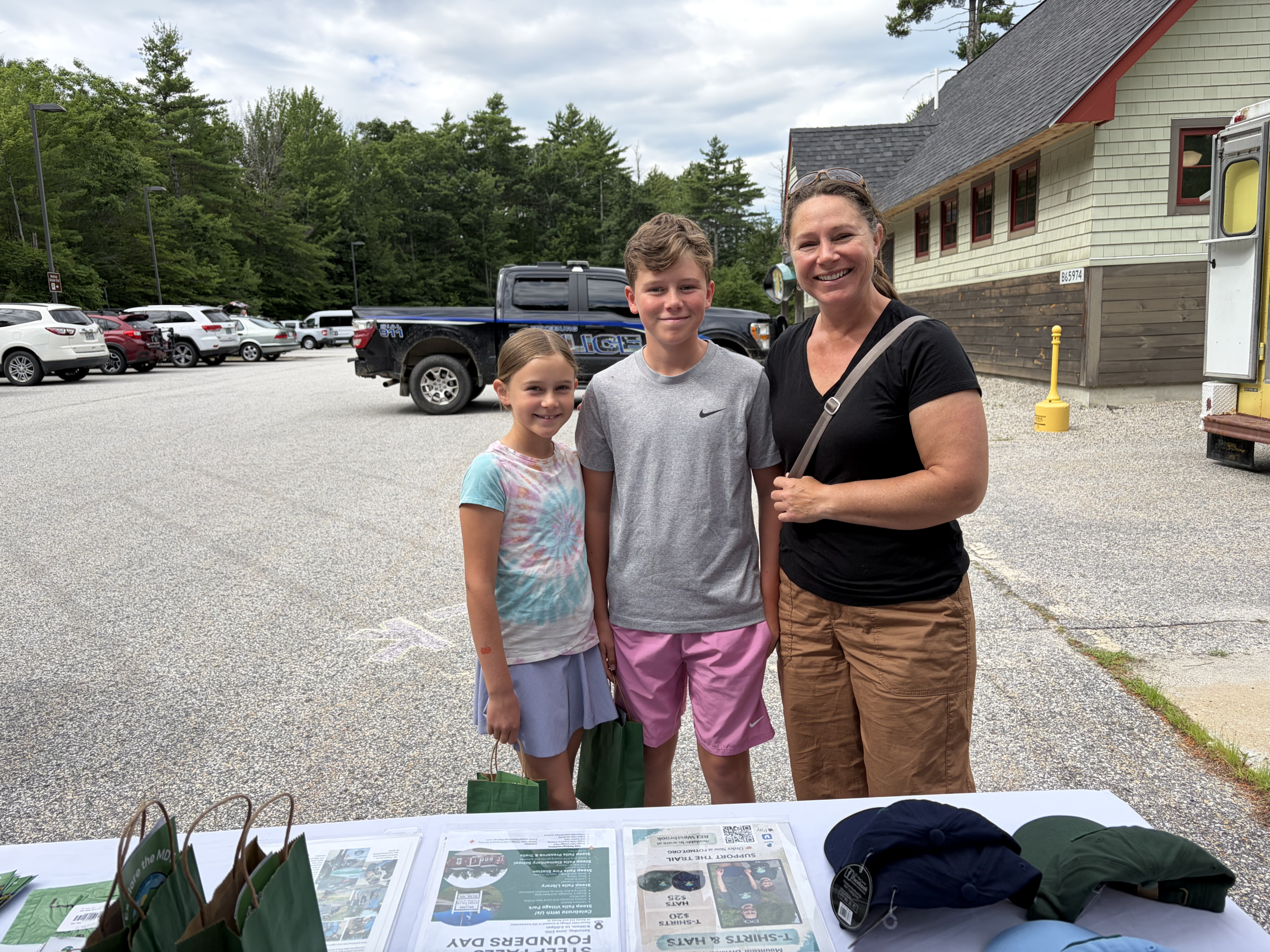 Beth Bosworth and family visited the Friends of the Mountain Dvision Trail booth at the Chalk the Trail event in Fryeburg on June 21